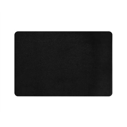 This image shows the rubber back of the dog bowl mat, as it sits against a white background. 