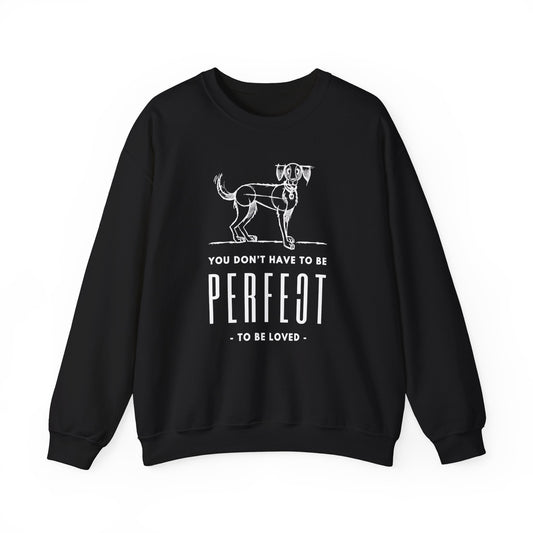 The Dogs Pure Love unisex sweatshirt in black showcases the slogan 'You don't have to be perfect to be loved,' against a white background.