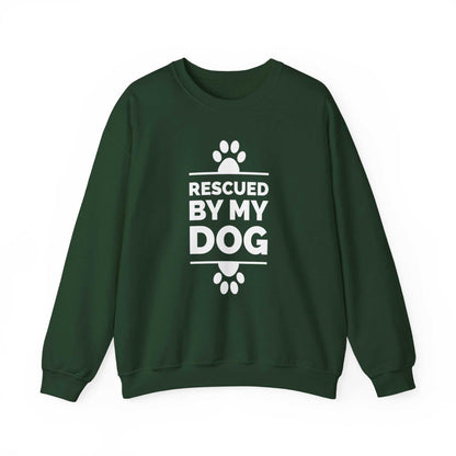 Featuring a Dogs Pure Love forest green unisex sweatshirt, with paws and text 'Rescued by my Dog,' against a white backdrop.