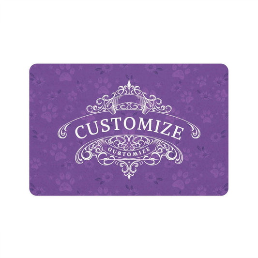 A purple dog bowl mat illustrated in daisies and a paw print design. A white customize graphic display element is beautifully crafted to display your dogs personality. 