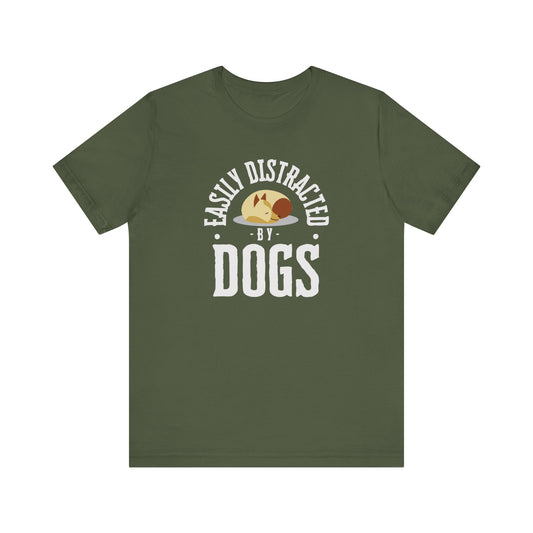 A military green unisex tee adorned with Dogs Pure Love's 'Easily Distracted by Dogs' design is placed against a white backdrop.