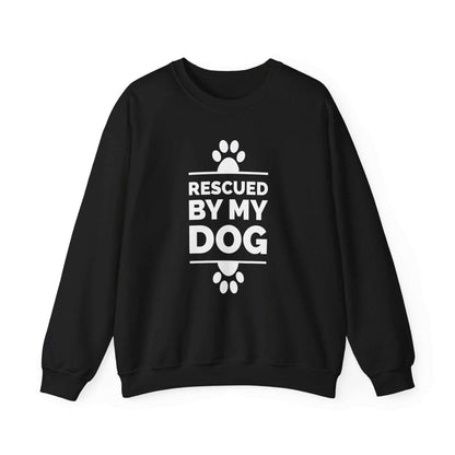  Introducing a Dogs Pure Love black unisex sweatshirt adorned with cute paw prints and the touching sentiment 'Rescued by my Dog,' showcased against a white backdrop.