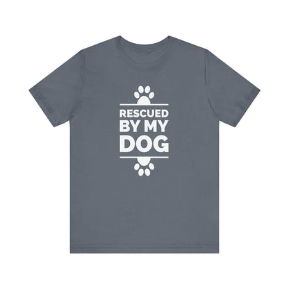 A Dogs Pure Love steel blue unisex tee, features paw prints and text 'Rescued by my Dog,' against a white canvas. 