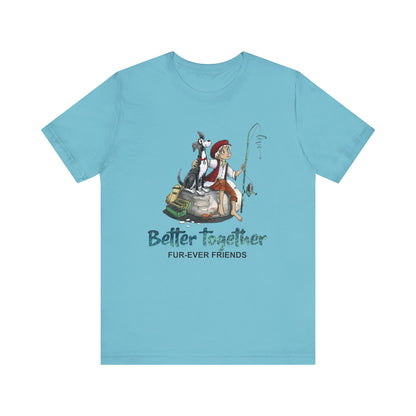 Turquoise unisex t-shirt with 'Dogs Pure Love Better Together' illustration of a boy and dog at the beach. The background is white.