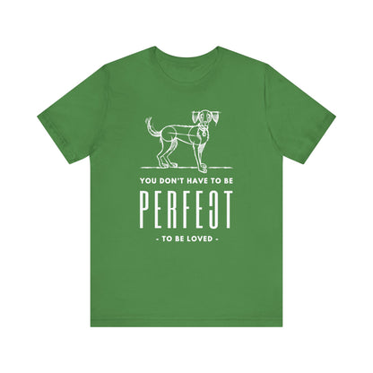 Against a white background, The Dogs Pure Love leaf green unisex t-shirt prominently showcases the slogan 'You don't have to be perfect to be loved,