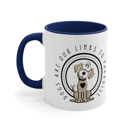 A two-toned navy and white ceramic mug features the 'Dogs are Paradise' slogan, on a white canvas.