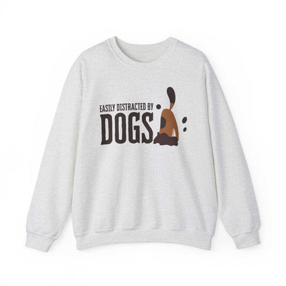 An ash-colored ‘Dogs Pure Love, Dog Dig’ unisex sweatshirt spotlights a dog digging with the slogan ‘Easily Distracted by Dogs,’ against a white background.