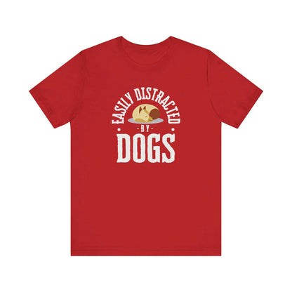 Surrounded by white,  a Dogs Pure Love 'Easily Distracted by Dogs' red unisex t-shirt features text and graphics.