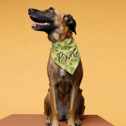 A dog wears the bandana with the name 'Pixie' written on it.