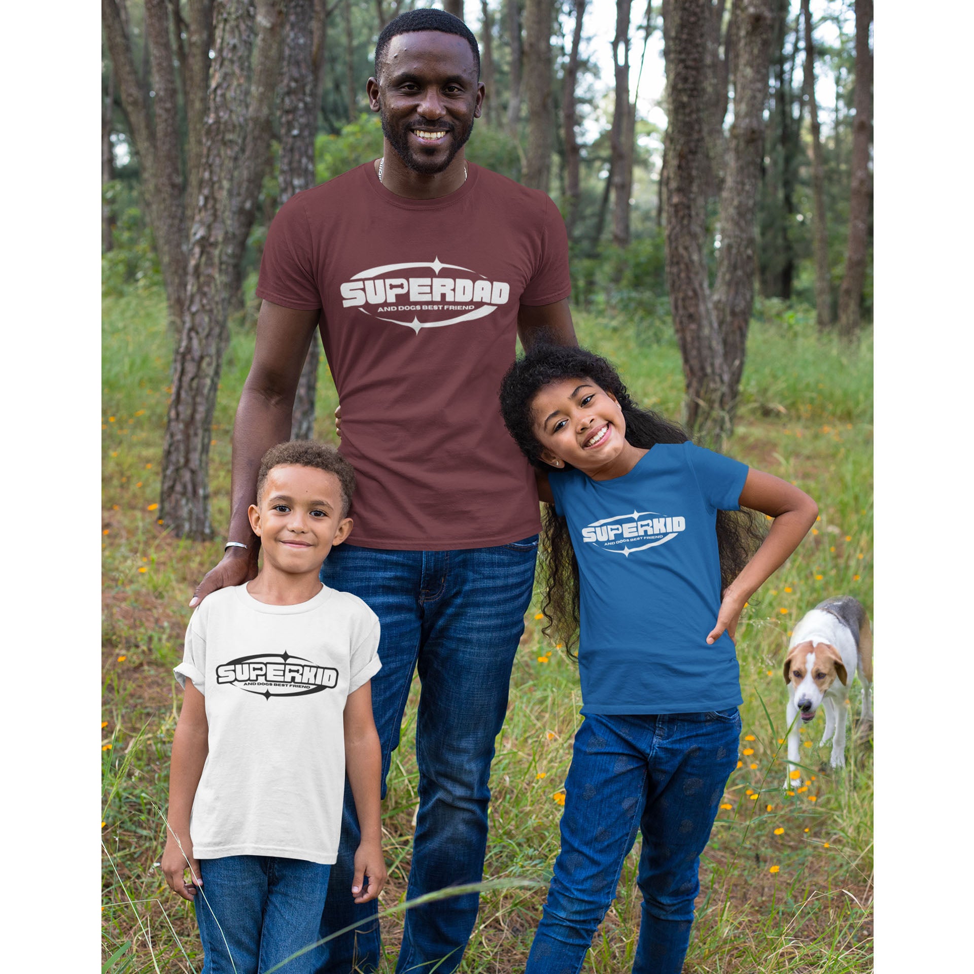 A dad and kids stand in a forest with their dog close by all wearing Dogs Pure Love tees.